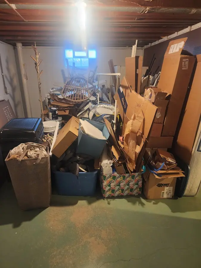 Roll-off dumpster container at job site for 2 Yard Dumpster Rental in Keokea