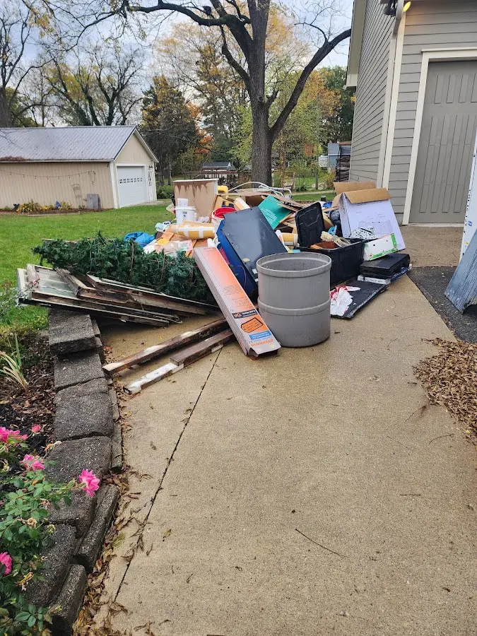 Dumpster being loaded with debris for 3 Yard Dumpster Rental in Keokea
